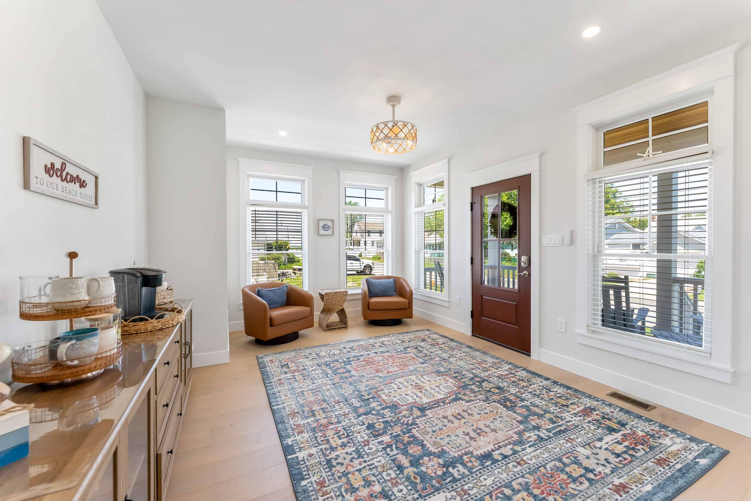 Living room at The Delford looking toward the fireplace and the front door