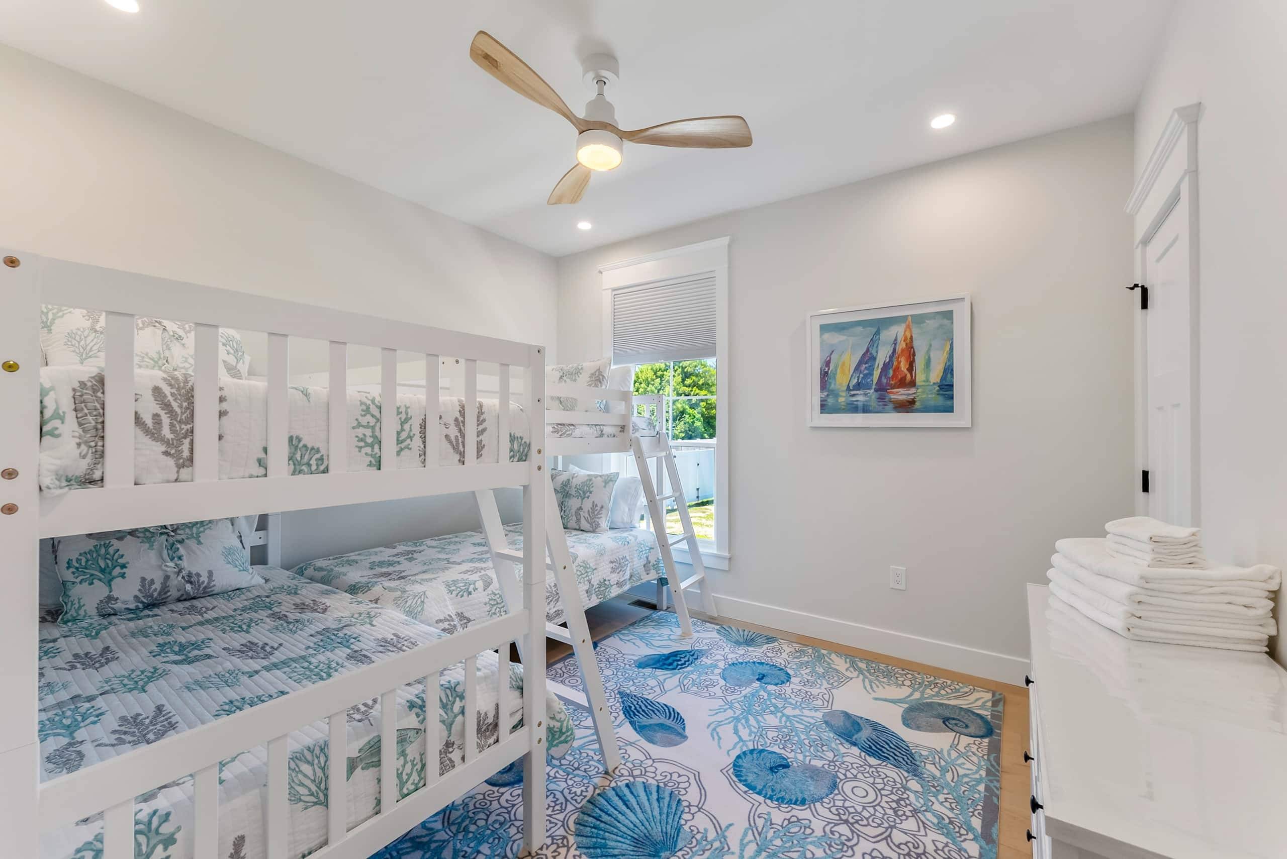 Bunk room at The Delford with a white bunk bed