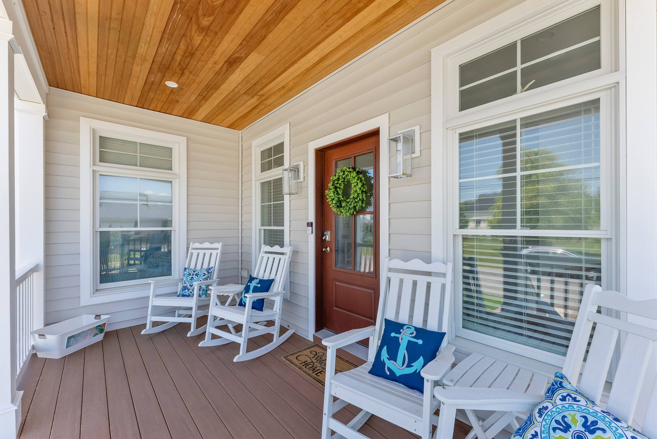 Rocking chairs on the covered porch at The Delford