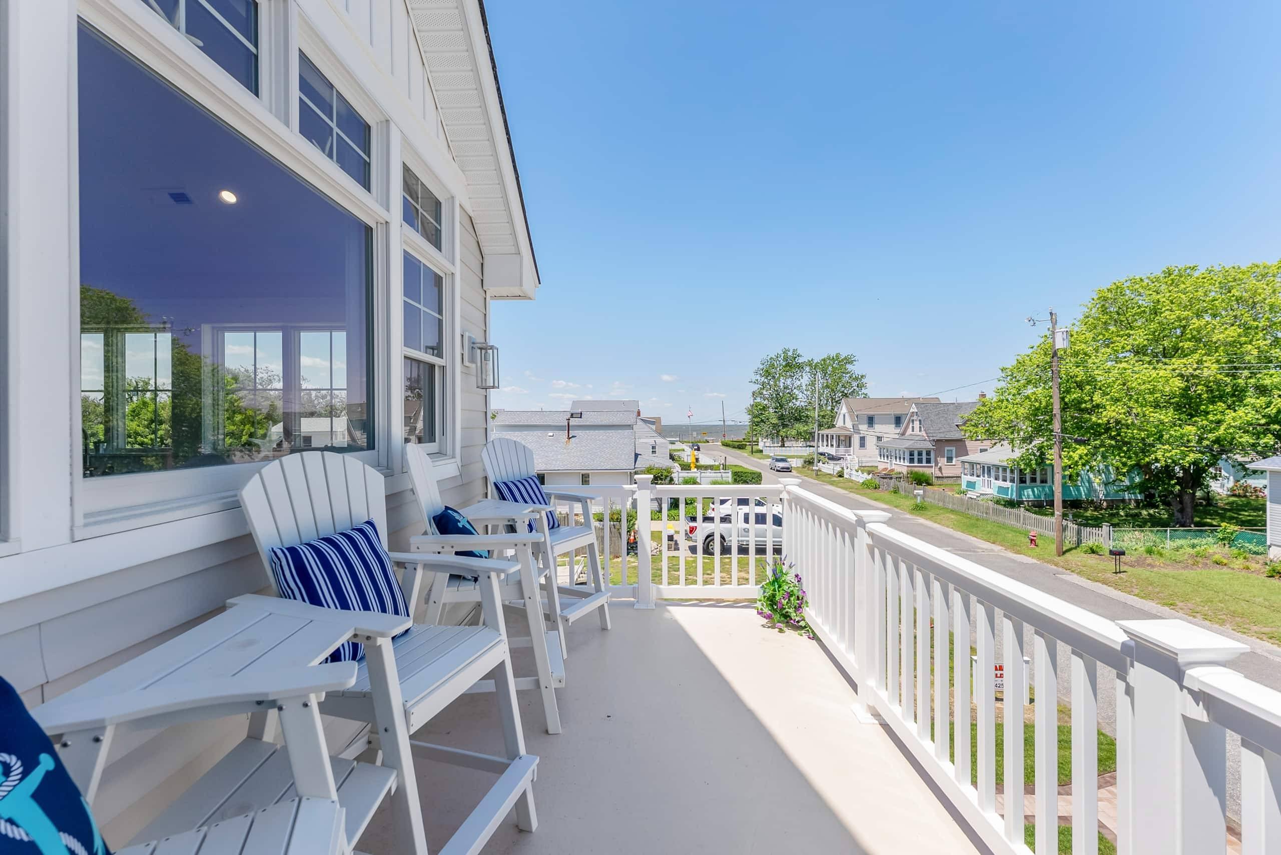 Adirondack chairs on the deck at The Delford, looking toward the Delaware Bay