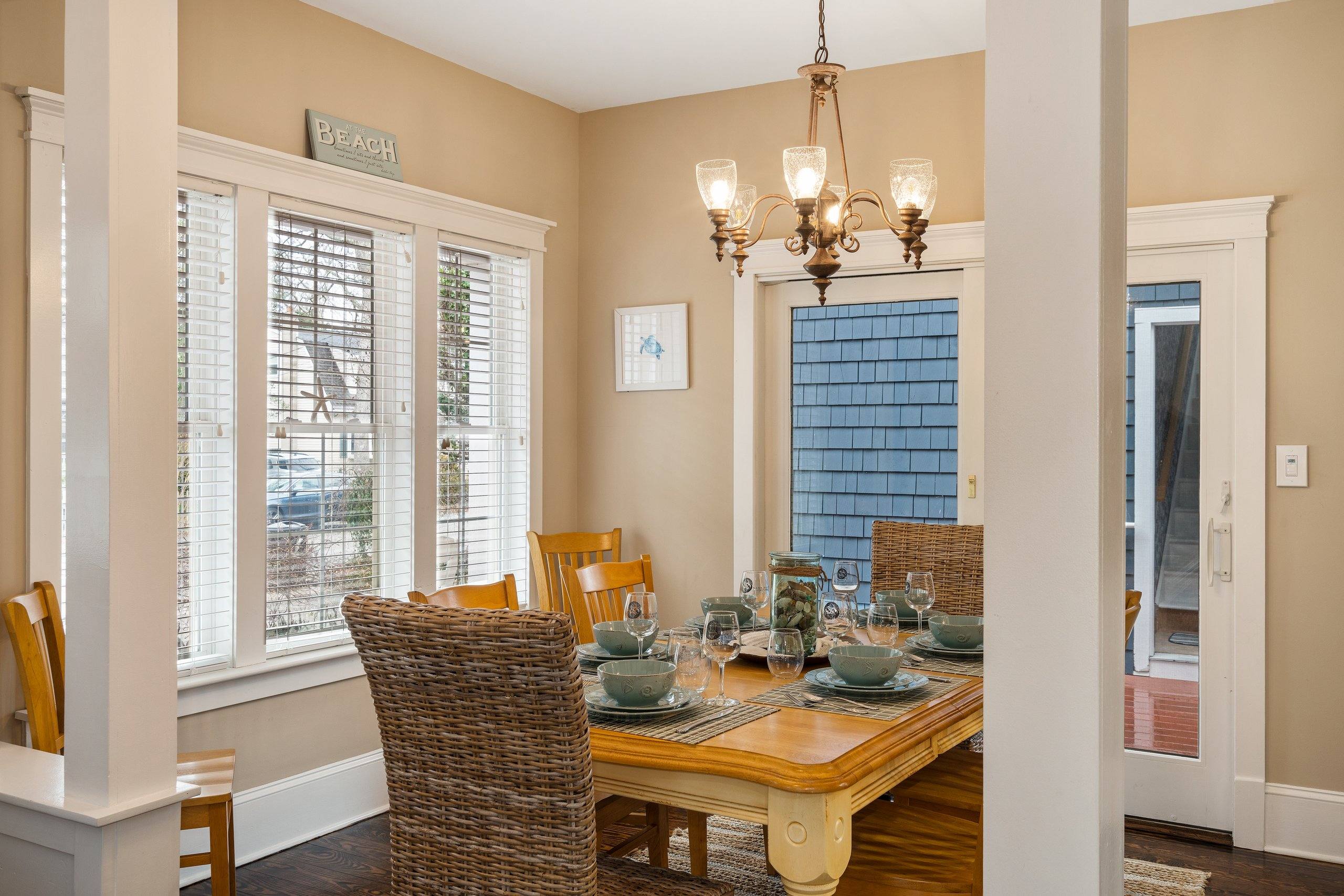 Dining corner at Fern with wine glasses and warm light